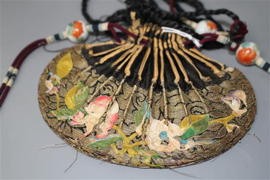 A Chinese silk purse and with four enamelled porcelain beads, late 19th century, purse 12.5cm wide
